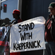 Protestors demonstrate in support of San Francisco 49ers quarterback Colin Kaepernick outside of the San Francisco Police Officers Association offices. (Photo: Getty Images)